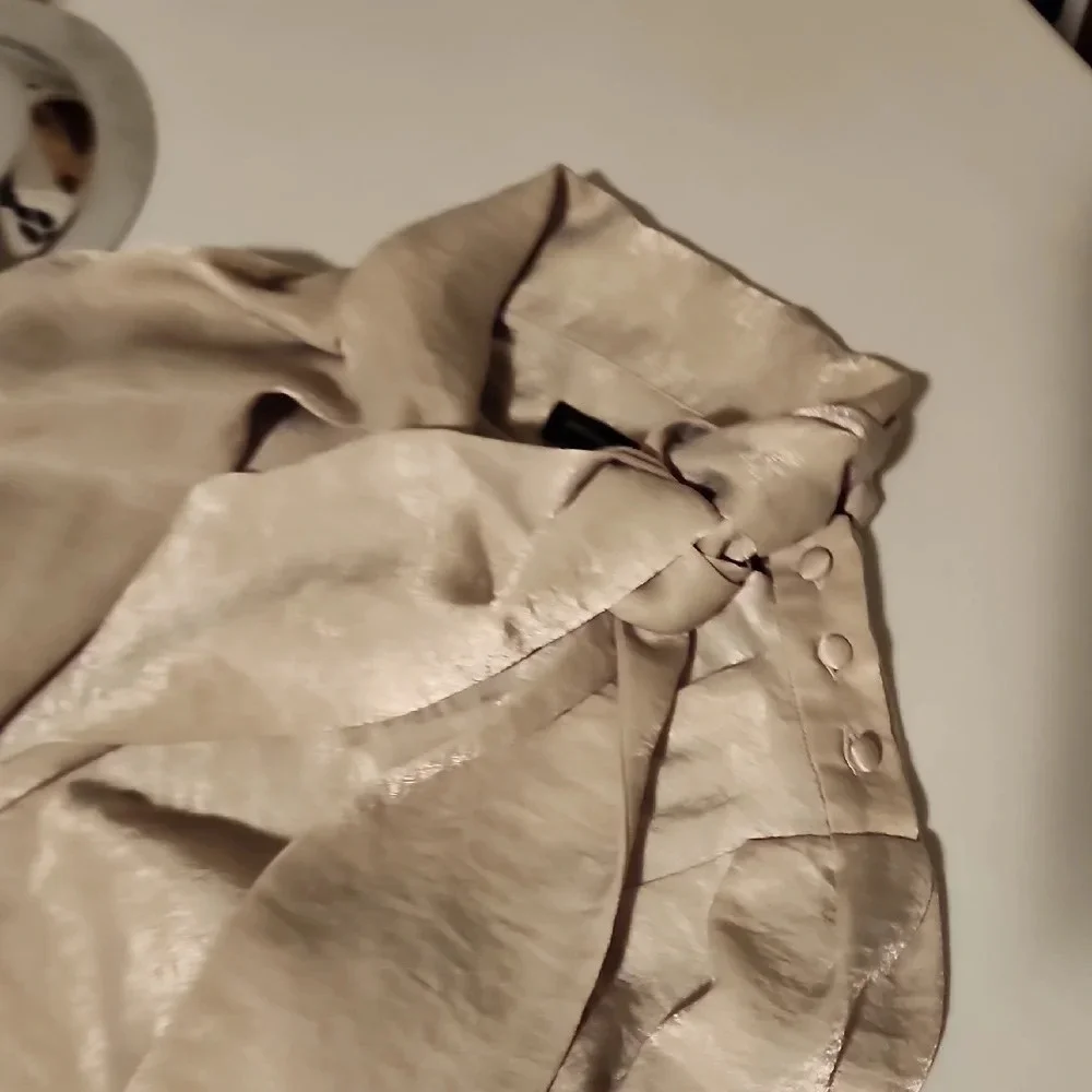 Banana Republic Cream Blouse with Puff Sleeves and Tie Front
